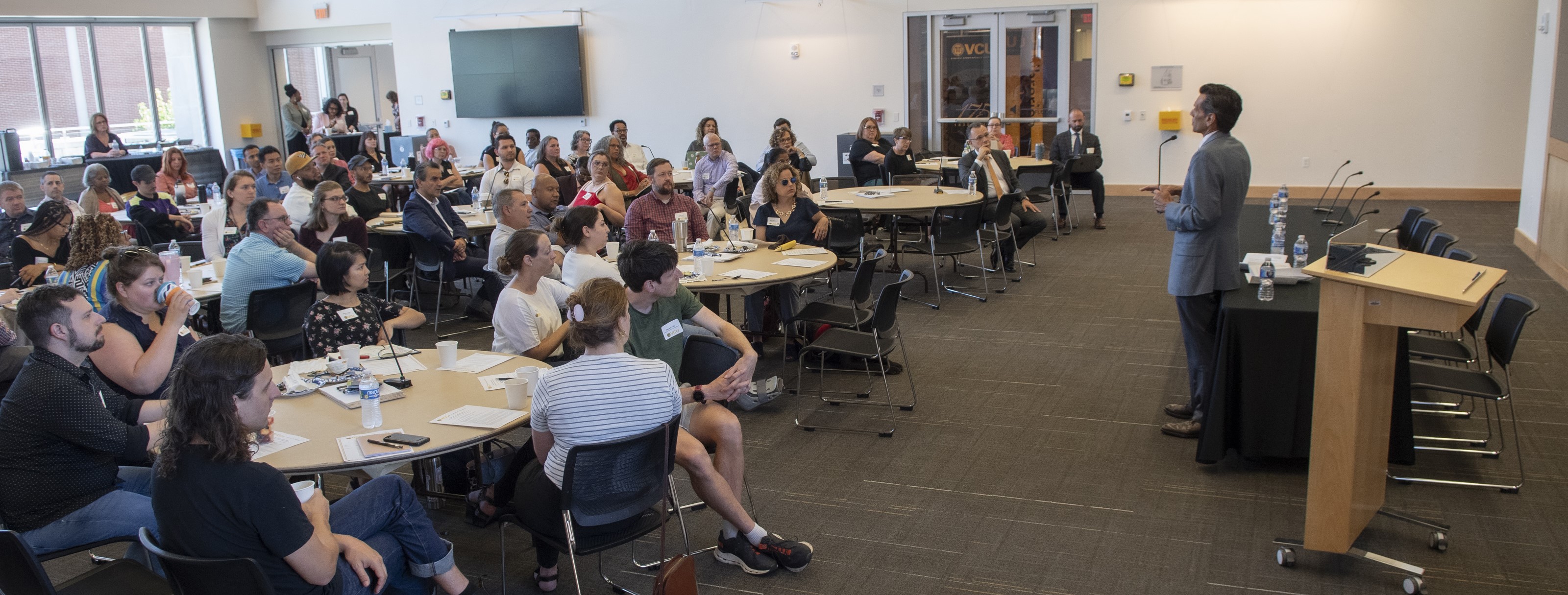 Image of guests listening to opening remarks by President Rao at New Faculty Orientation, August 2023,